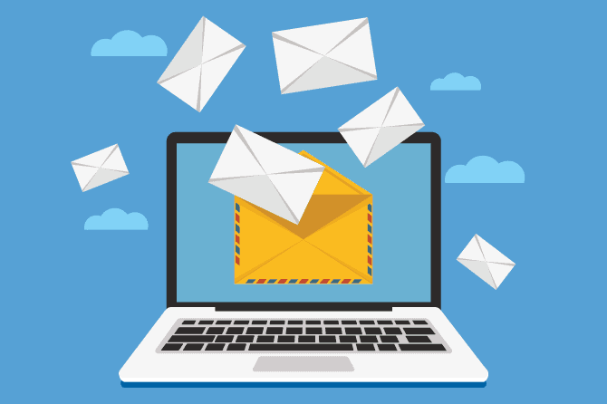laptop with envelopes falling