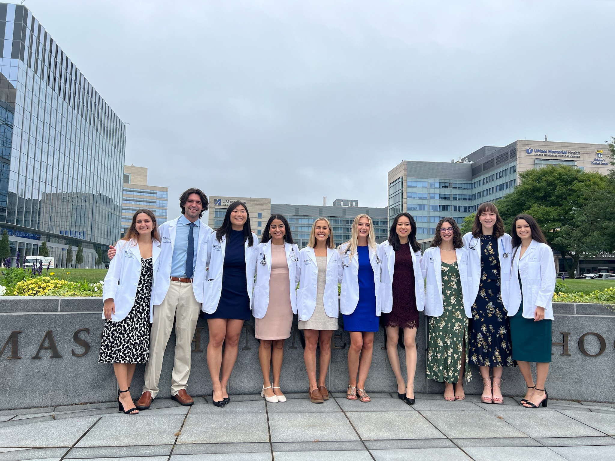 MD-PhD students in white coats