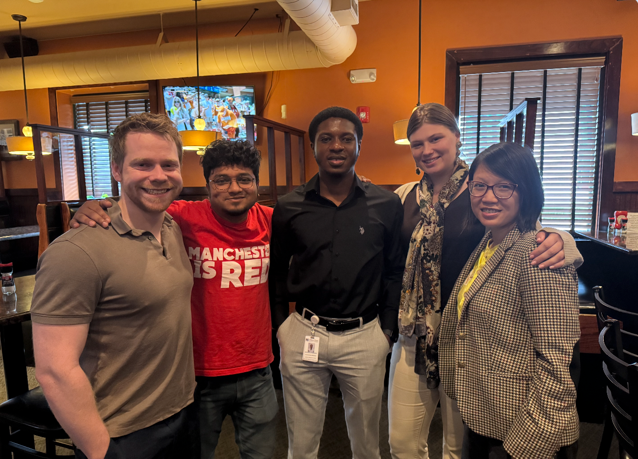 The Tran lab celebrating lab member, David, as he departs the lab