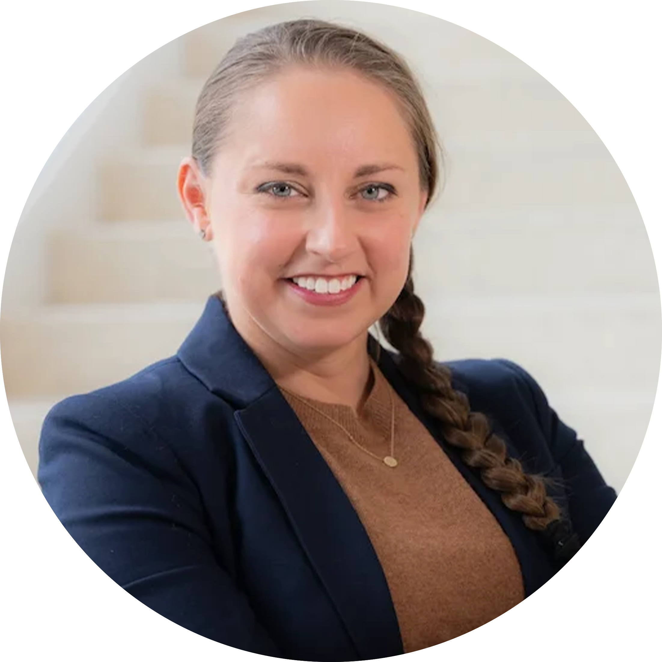 A headshot of Angela Messmer-Blust
