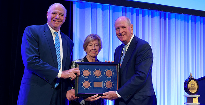 Eric Dickson, MD’95, president and CEO of UMass Memorial Health, and Lynda Young, MD, chair of the UMass Memorial Health Board of Trustees, are presented with five medallions representing the five UMass Memorial Health Endowed Chairs. Photo: John Gillooly